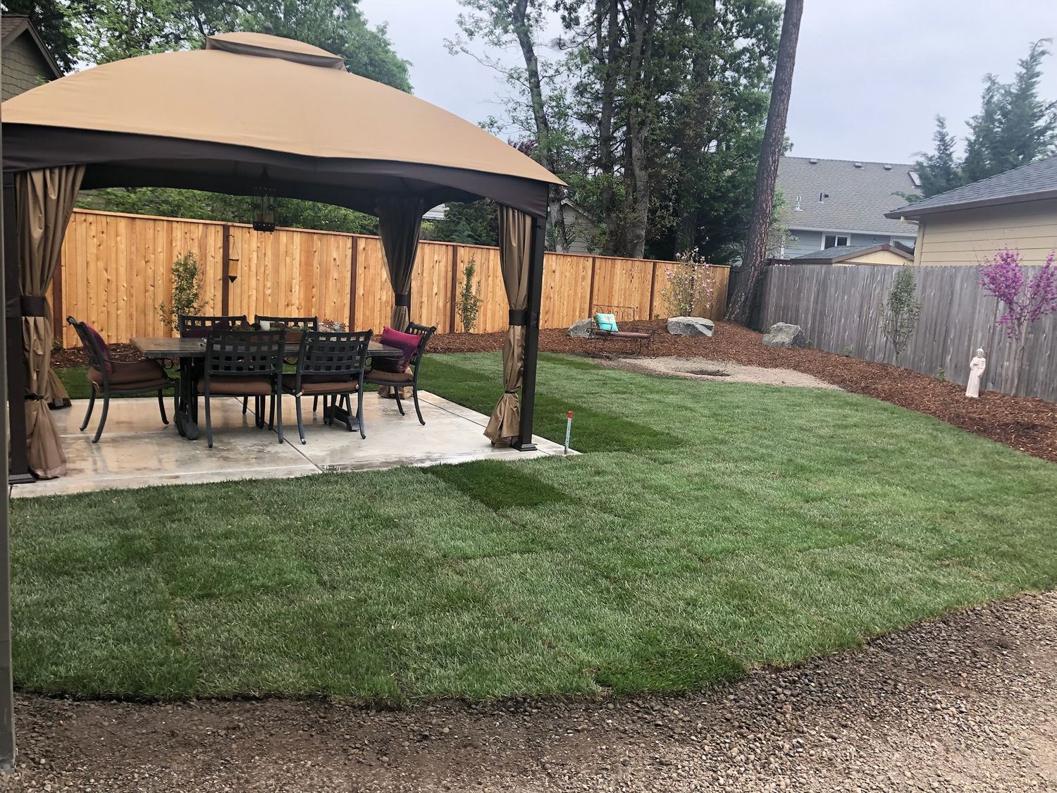 Finished lawn and planting area supported by a new irrigation installation
